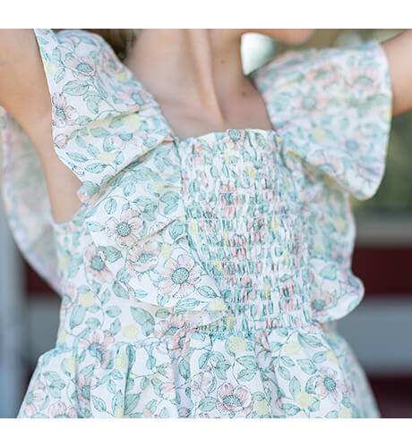 Vestido niña flores salmón espalda abierta &amp; lazada de Coco Acqua | Aiana Larocca