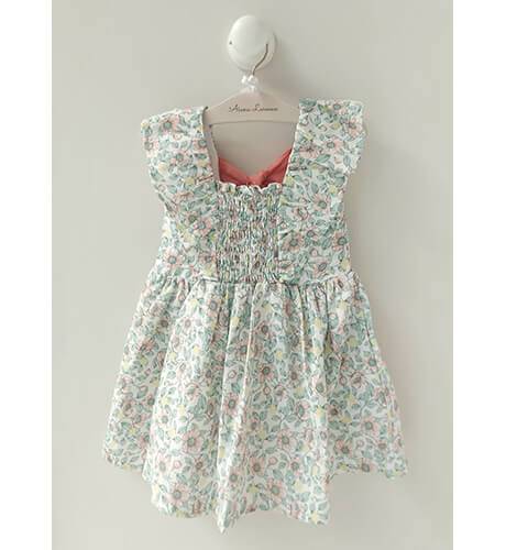 Vestido niña flores salmón espalda abierta &amp; lazada de Coco Acqua | Aiana Larocca