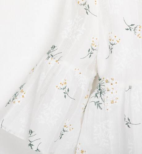 Vestido blanco flores manga francesa de Blanca Valiente | Aiana Larocca