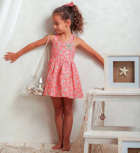 Vestido niña coral estrellas de Basmartí | Aiana Larocca