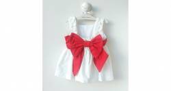 Vestido niña blanco bordado &amp; lazada roja de DBB Collection | Aiana Larocca