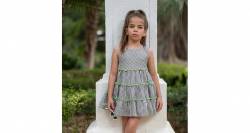 Vestido niña a rayas volantes ribeteado en color lima de Nekenia | Aiana Larocca